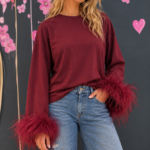 Maglia bordeaux con piume