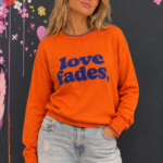"Love Fades" sweater